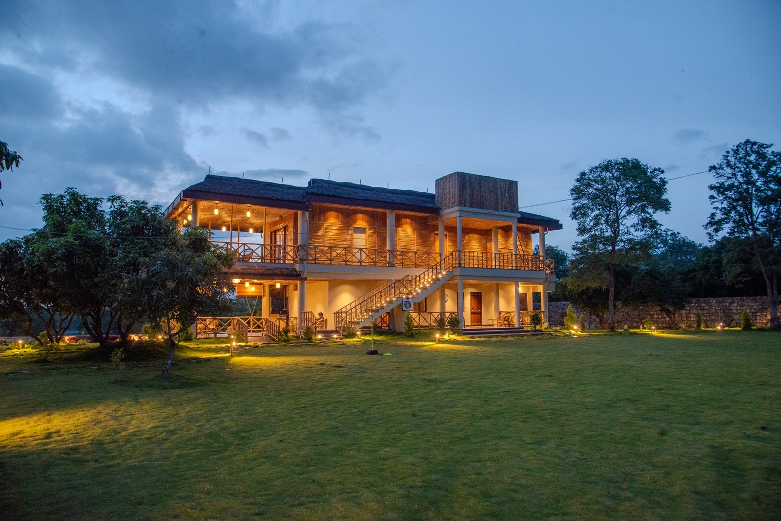 Jingle Woods Farmstay exterior at night